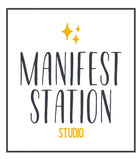 Logo that says Manifest Station Studio in black letters with yellow stars